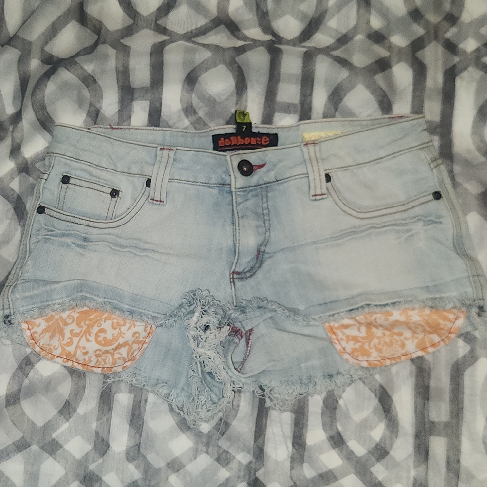 Dollhouse Light Wash Distressed Denim Shorts with Orange Accents